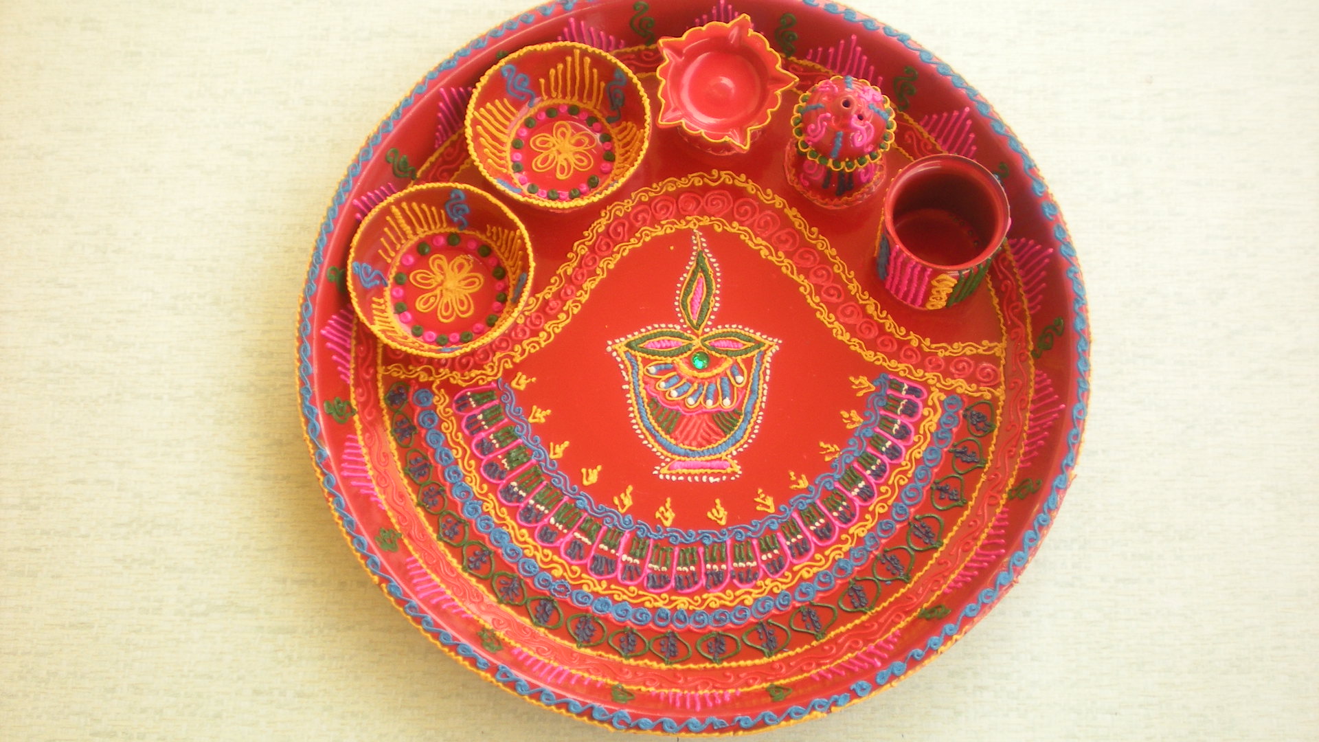 Manufacturers Exporters and Wholesale Suppliers of Decorated Pooja Thalis with Ceramic Art Work  01 Nagpur Maharashtra